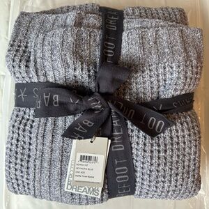 Barefoot Dreams waffle throw blanket in Pacific blue